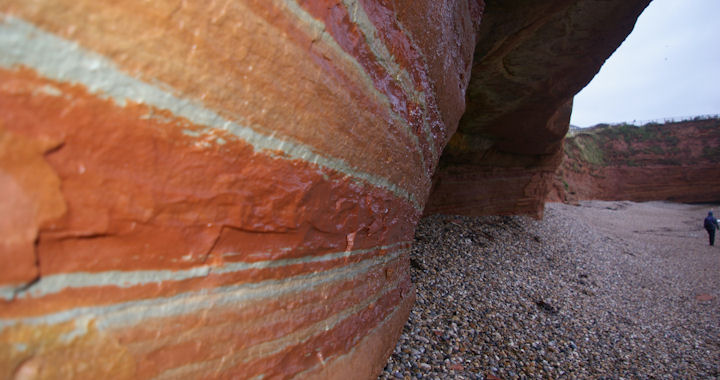 Stripey sandstone rocks at Ladram Bay, Devon. Representative of the varying conditions that existed here during the Triassic period.